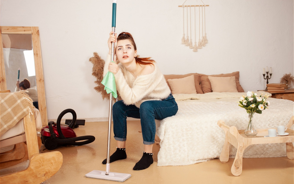 woman-relaxing-on-bed-after-cleaning-bedroom-2026-03-17-20-04-56-utc (1).jpg