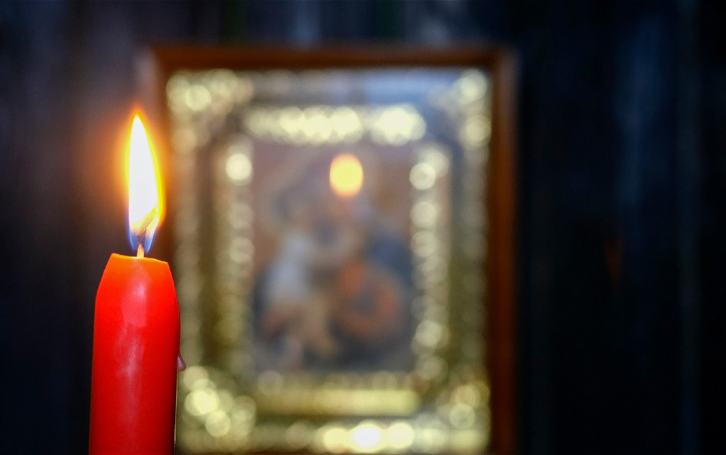 candle-burning-in-dark-against-soft-focus-virgin-m-2026-03-16-01-24-51-utc (1).jpg