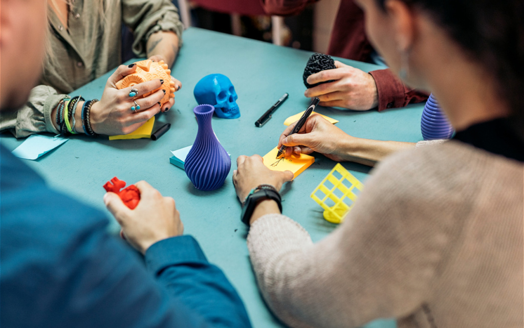 team-collaborating-with-3d-printed-objects-at-tabl-2026-03-10-01-07-58-utc (1).jpg