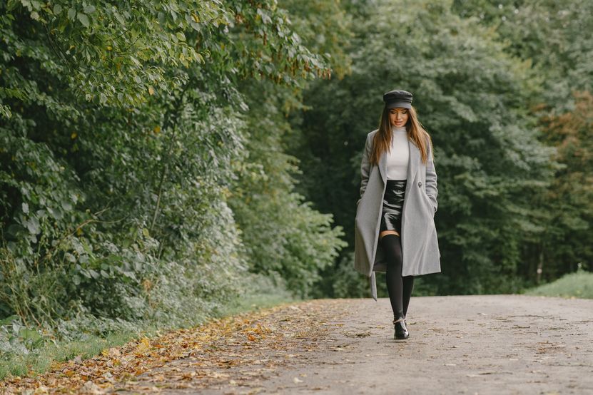 girl-walks-woman-gray-coat-brunette-with-black-cap.jpg