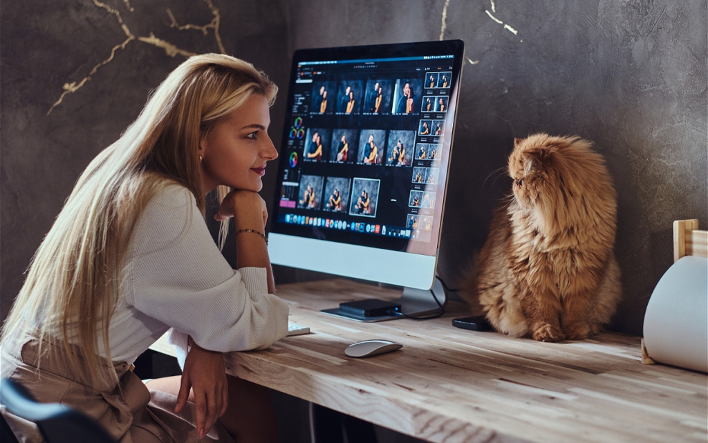 woman-working-at-desk-with-pet-cat-nearby-2026-03-17-03-30-47-utc (1).jpg