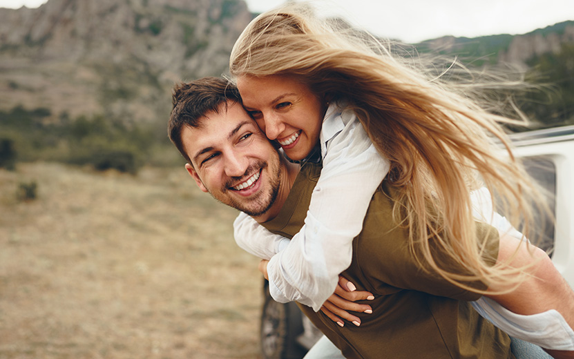 happy-loving-couple-hiking-and-hugging-in-mountain-2022-01-18-23-38-21-utc.jpg