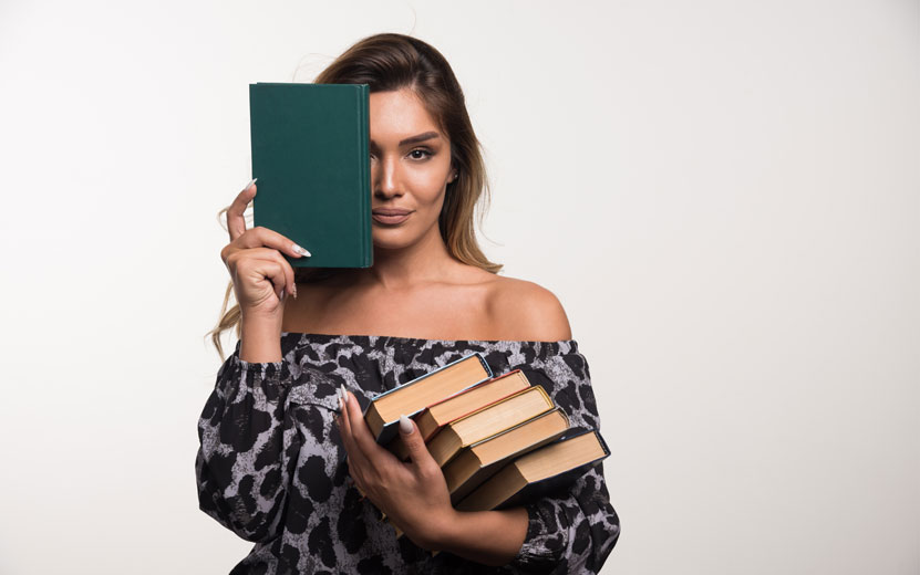 young-woman-showing-books-w.jpg