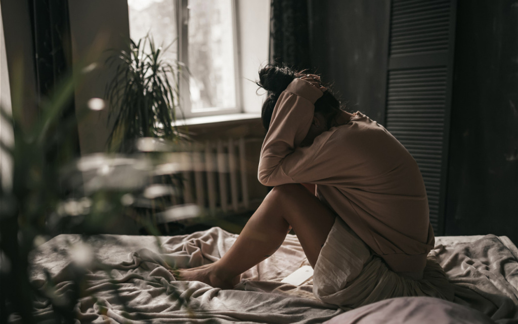 candid-sad-brunette-with-bun-of-hair-in-beige-clot-2026-01-05-23-31-32-utc (1).jpg