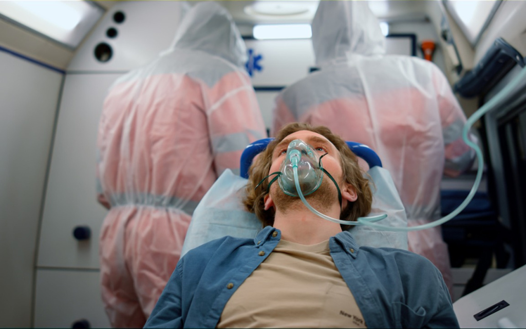 man-lying-on-gurney-inside-ambulance-with-oxygen-2026-03-26-05-21-20-utc (1).jpg