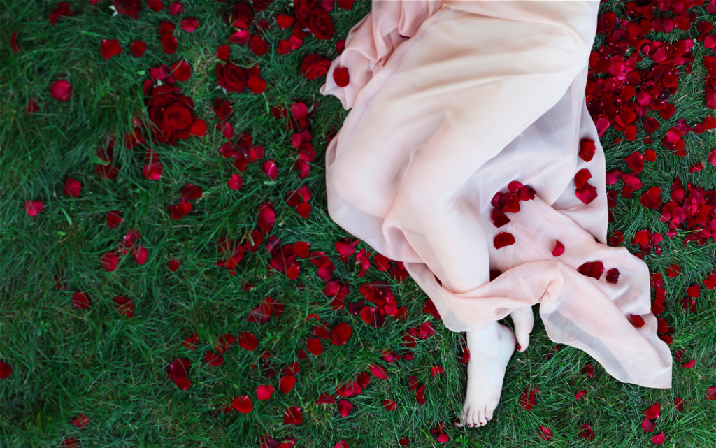 woman-in-gown-lying-on-grass-with-rose-petals-2026-09-21-14-01-21-utc (1).jpg