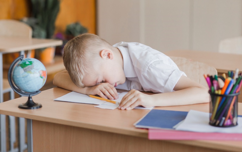 little-pupil-laying-table-classroom (1).jpg