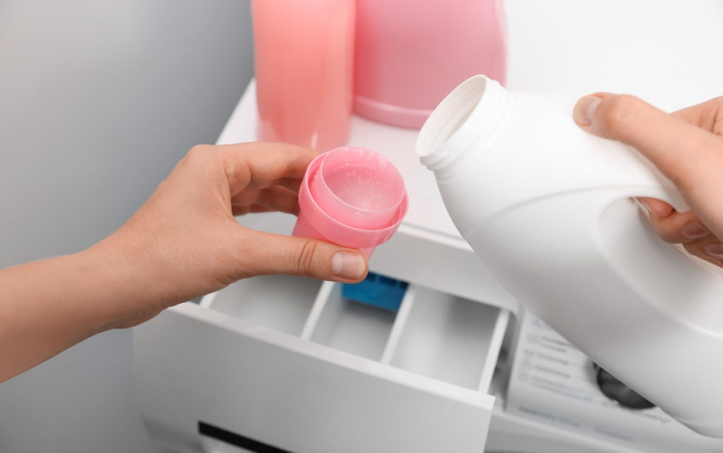 pouring-laundry-detergent-into-washing-machine-dis-2026-03-27-01-38-03-utc (1).jpg