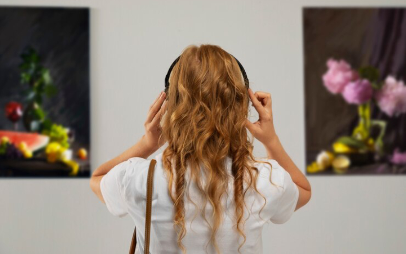 back-view-woman-wearing-headphones_23-2149911898.jpg