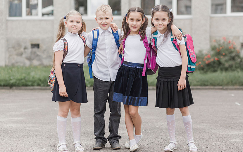 boy-hugging-girls-near-school.jpg