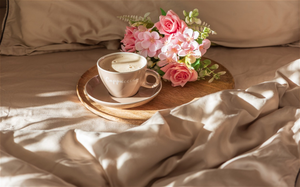 cappuccino-and-pink-flowers-on-a-tray-over-bed-she-2026-09-25-05-04-33-utc (1).jpg