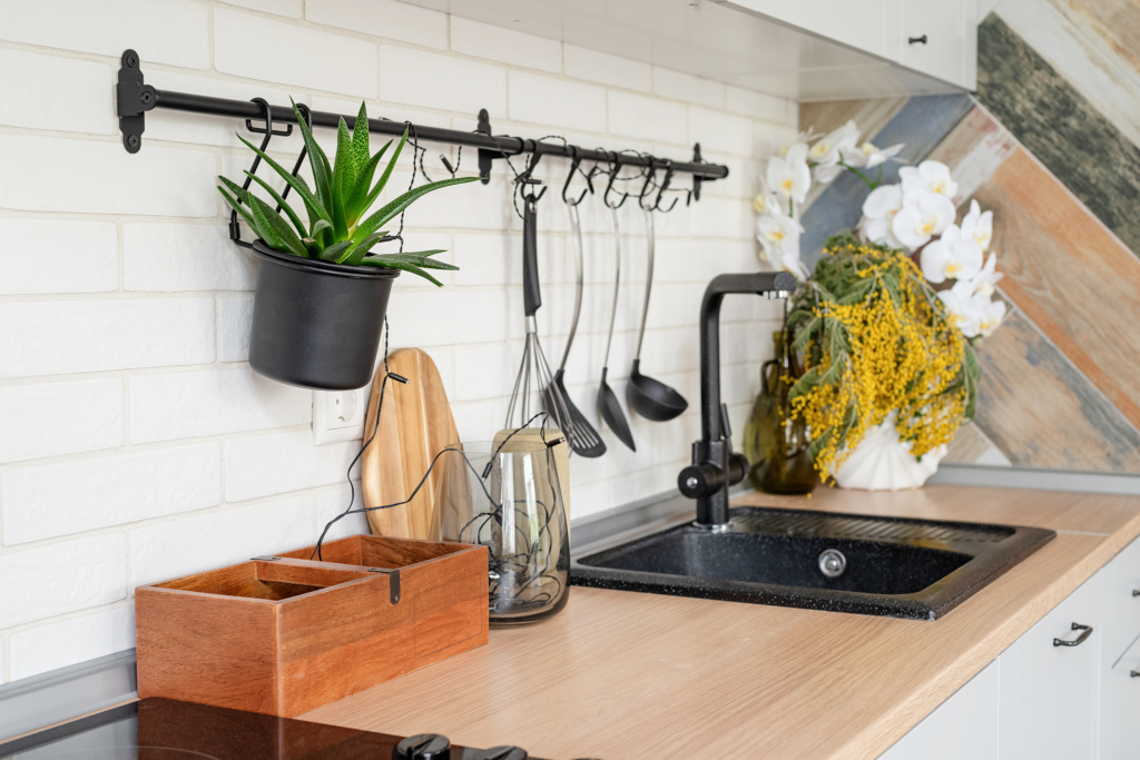 modern-kitchen-interior-with-plants-and-utensils-2026-03-20-04-38-33-utc.jpg