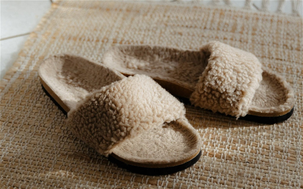 comfortable-fur-slippers-on-woven-rug-close-up-2026-09-22-01-00-36-utc (1).jpg