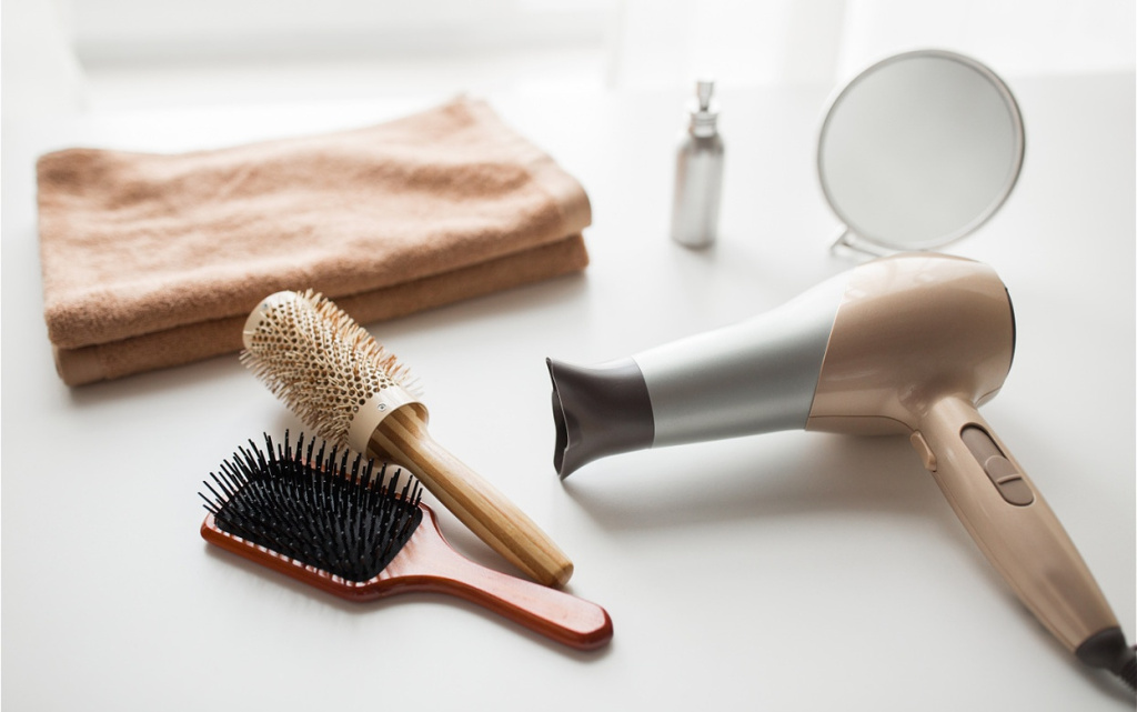 hair-dryer-and-brushes-on-a-white-table-2026-03-09-07-59-52-utc (1).jpg