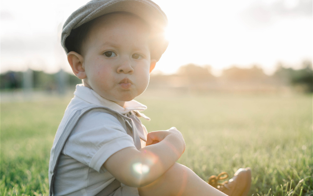 toddler-with-cap-sitting-in-the-grass-2026-09-23-00-48-59-utc (1).jpg