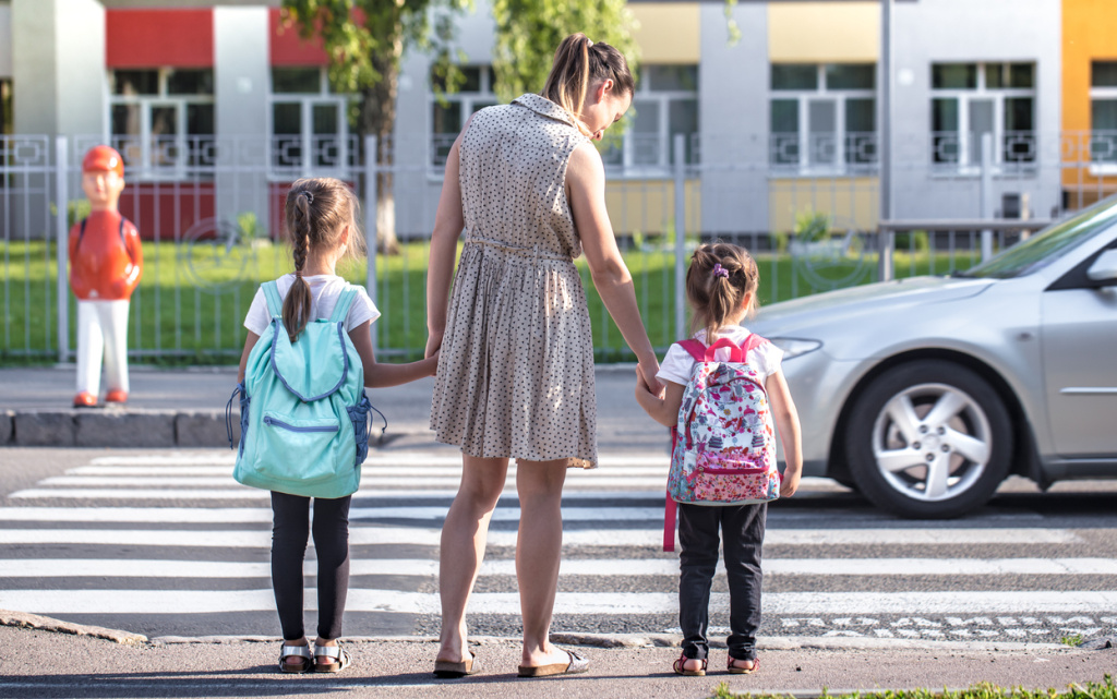 back-school-education-concept-with-girl-kids-elementary-students-carrying-backpacks-going-class (1) (1).jpg