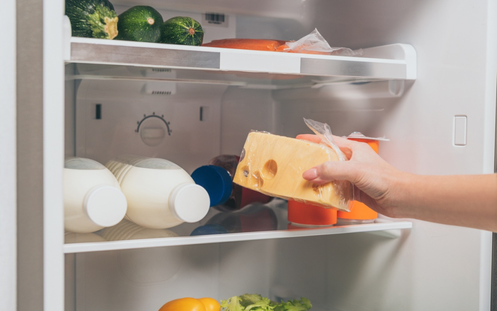 cropped-view-of-woman-holding-cheese-near-open-fri-2026-01-05-23-57-13-utc (1).jpg