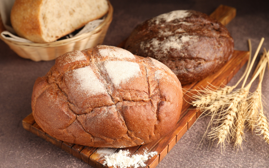 artisan-crusty-bread-loaves-on-wooden-board-with-w-2026-09-25-04-26-34-utc (1).jpg