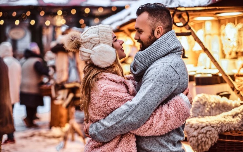 an-attractive-couple-in-love-a-stylish-couple-wearing-warm-clothes-cuddling-together-and-looking-each-other-at-the-winter-fair-at-a-christmas-time_613910-21778 (1).jpg