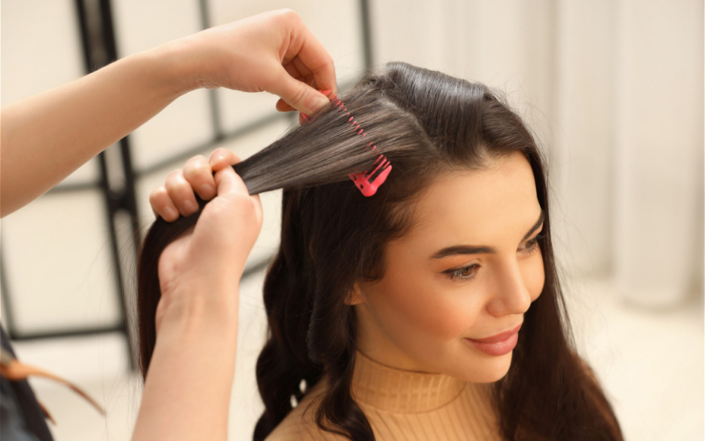 woman-getting-her-long-dark-hair-styled-indoors-2026-09-25-02-17-17-utc (1).jpg