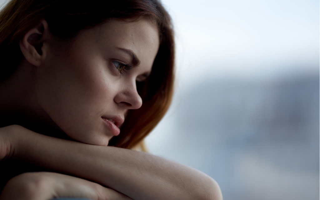 woman-sitting-on-a-windowsill-covered-with-a-blank-2026-01-08-07-48-34-utc (1).jpg