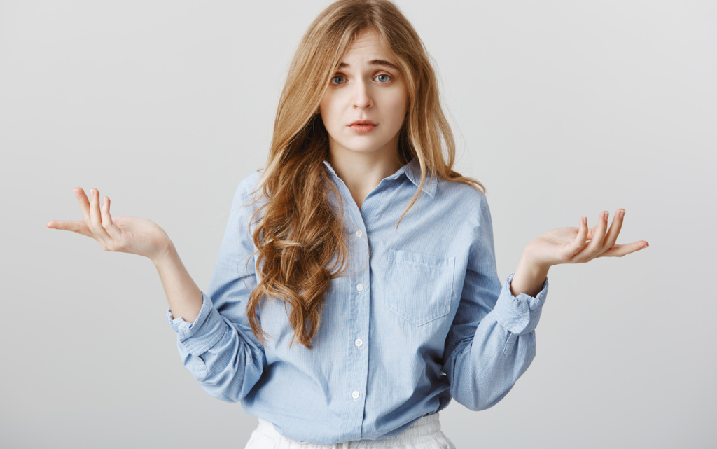 upset-with-lack-choices-portrait-gloomy-miserable-caucasian-female-model-spreading-palms-lifting-eyebrows-feeling-despair-confusion-having-no-idea-what-standing-gray-wall (1) (1).jpg