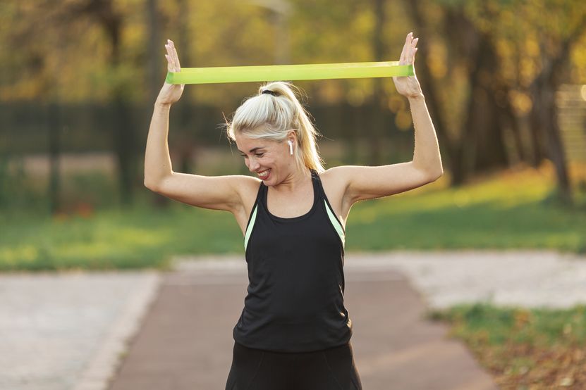 smiling-blonde-woman-doing-fitness-exercises.jpg