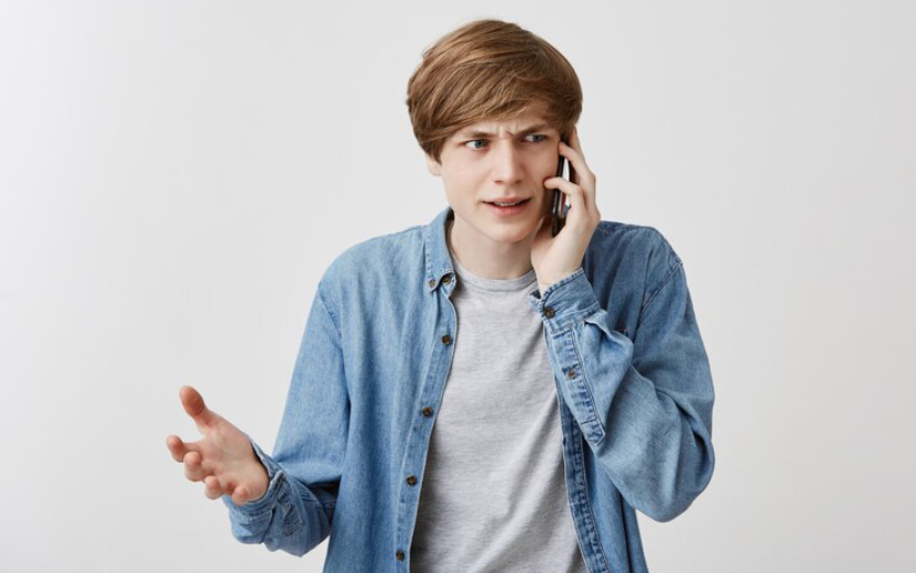 nervous-angry-guy-with-serious-expression-having-phone-conversation-frowning-face-gesturing-actively-discussing-complicated-issues-relationships-negative-reaction-modern-communication_176420-13635.jpg