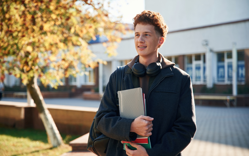 young-student-is-outside-the-university-in-black-2023-11-29-16-40-46-utc.jpg