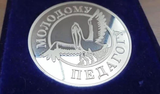 автора