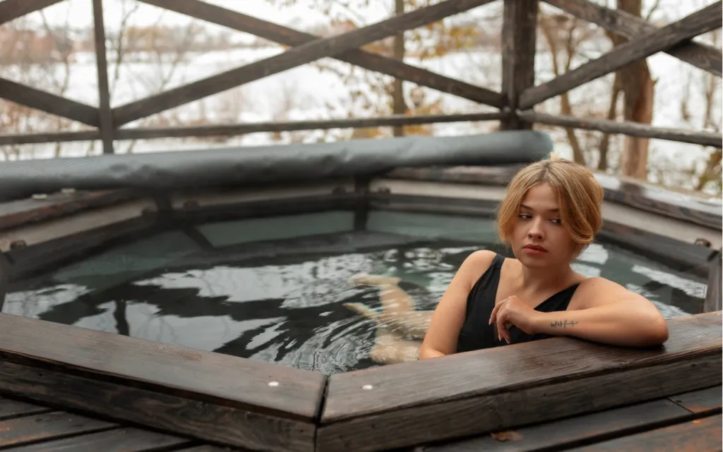 medium-shot-woman-experiencing-cold-exposure-wellness (1).jpg