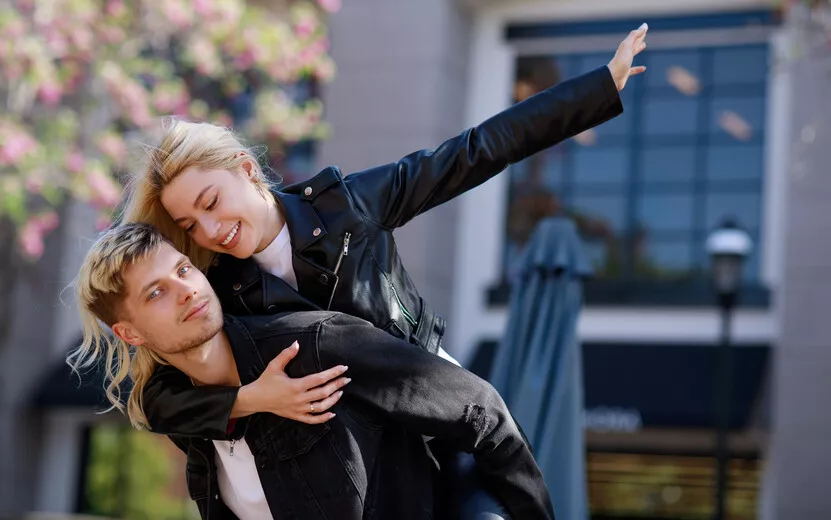 result_young-man-taking-his-girlfriend-his-back-they-are-feeling-very-happy-high-quality-photo.jpg
