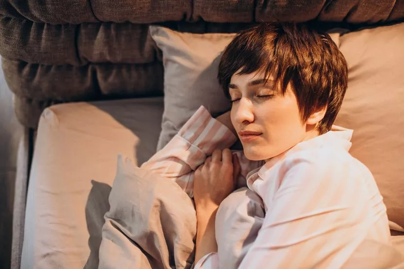 woman-pajamas-waking-up-bed.jpg