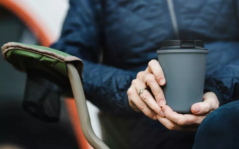 senior-woman-holding-reusable-cup (1).jpg