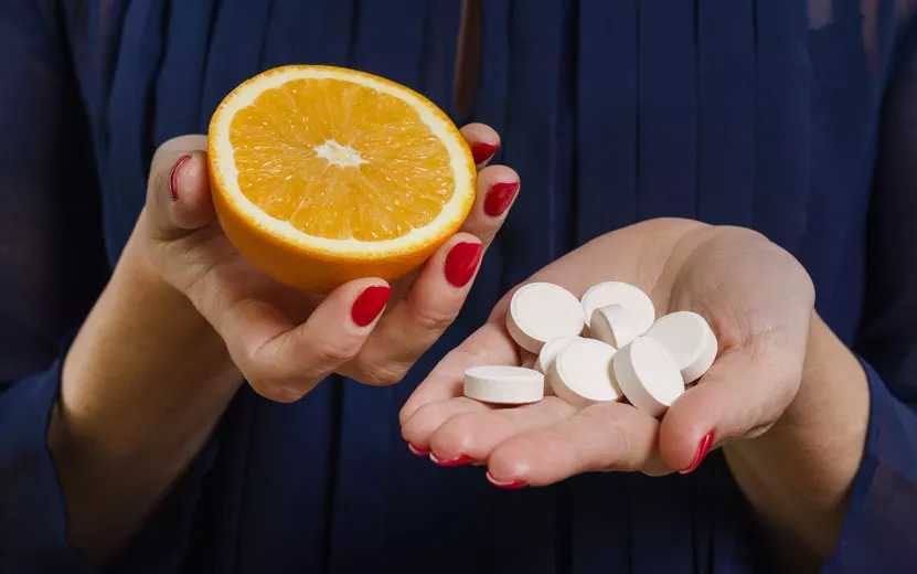 a-woman-holds-a-natural-vit.jpg