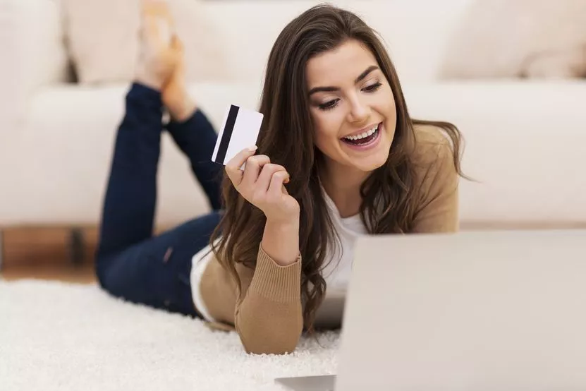 smiling-female-paying-shopping-by-credit-card.jpg smiling-female-paying-shopping-by-credit-card.jpg