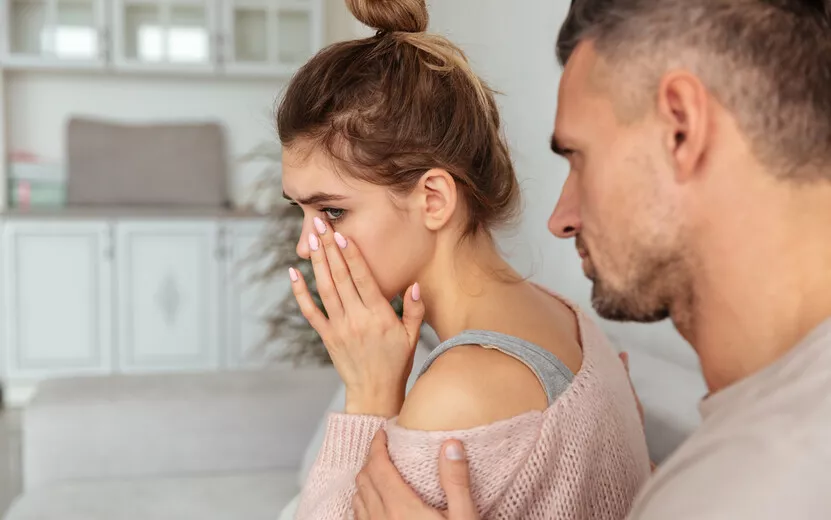 result_back-view-careful-man-sitting-couch-calm-down-his-upset-girlfriend-which-crying-home.jpg