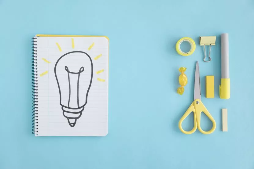overhead-view-hand-drawn-light-bulb-notebook-with-stationary-blue-background.jpg overhead-view-hand-drawn-light-bulb-notebook-with-stationary-blue-background.jpg