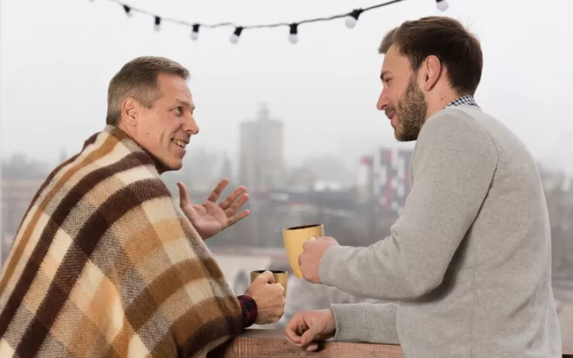 side-view-father-with-blanket-son-holding-cups-hands_23-2148414841.jpg