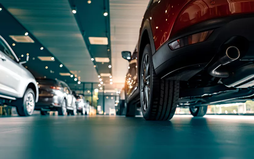 rearview-car-parked-in-luxury-showroom-car-dealer-2023-11-27-05-16-03-utc.jpg