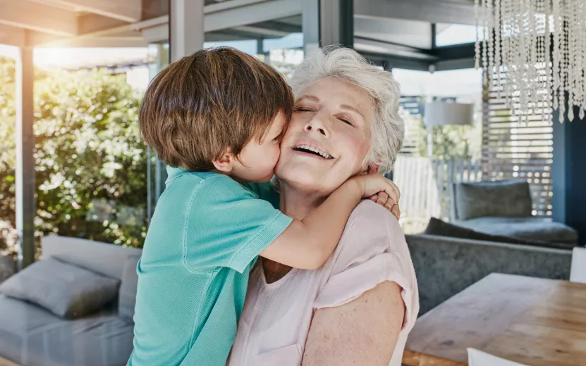 grandson-and-grandmother-playing-with-toy-airplane-2023-11-27-05-26-54-utc.jpg
