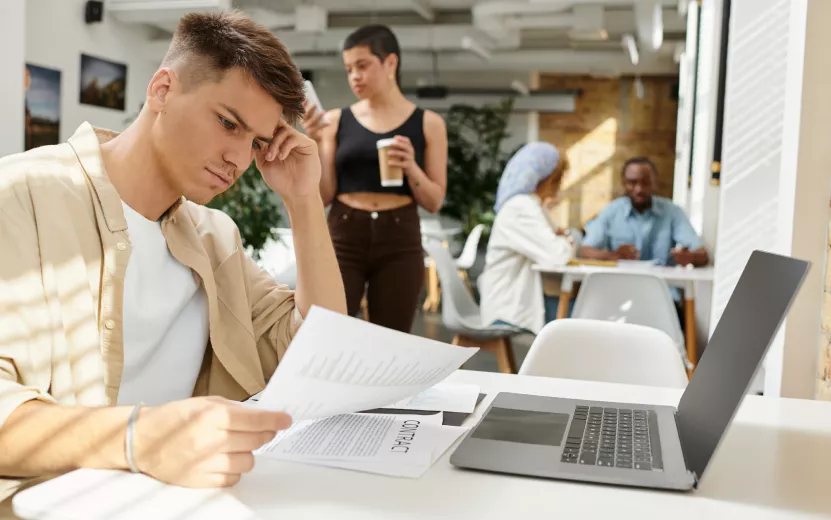 focused-man-working-in-office-laptop-and-document-2023-11-27-05-35-01-utc.jpg