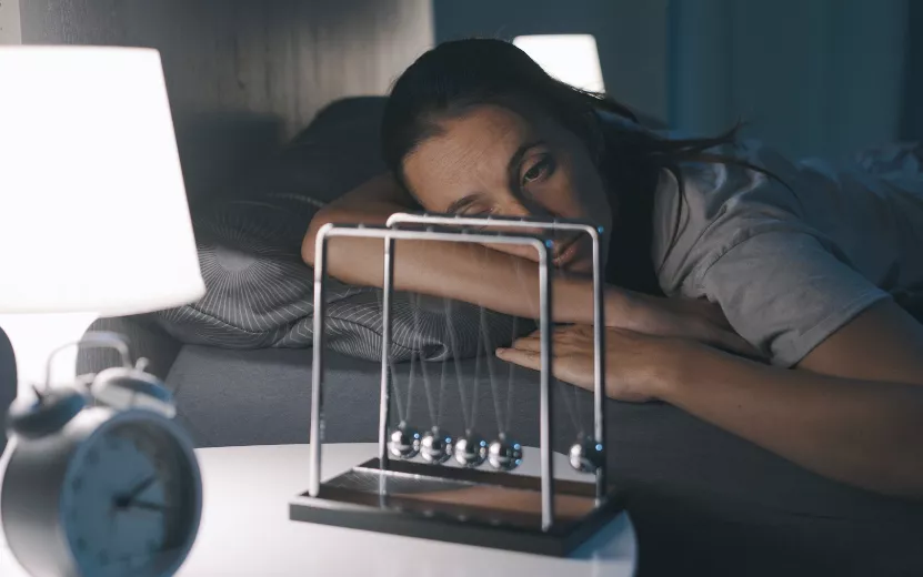 sad-woman-suffering-from-insomnia-in-her-bed-2023-11-27-04-56-03-utc (1).jpg