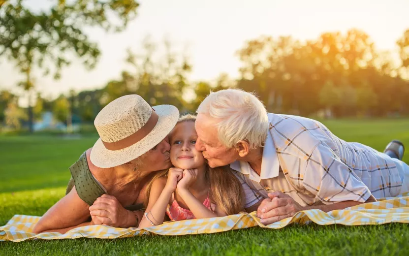 grandparents-kissing-granddauther-2023-11-27-05-29-17-utc.jpg