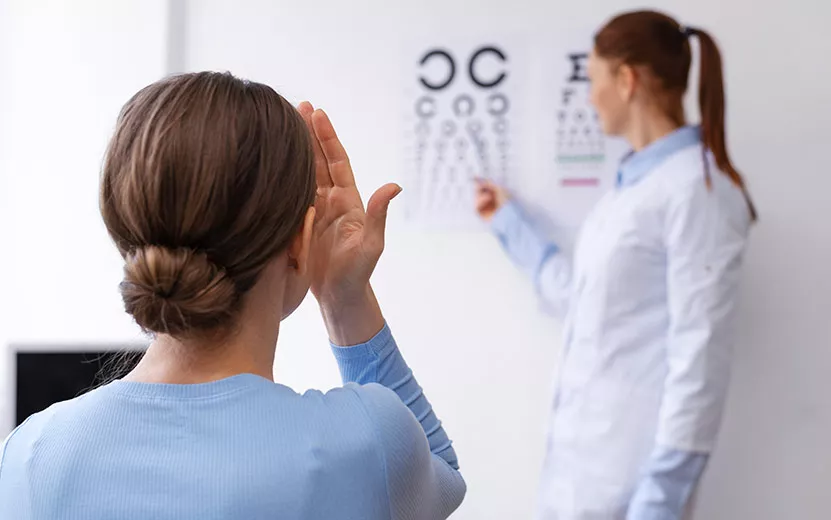 doctor-testing-patient-eyesight.jpg