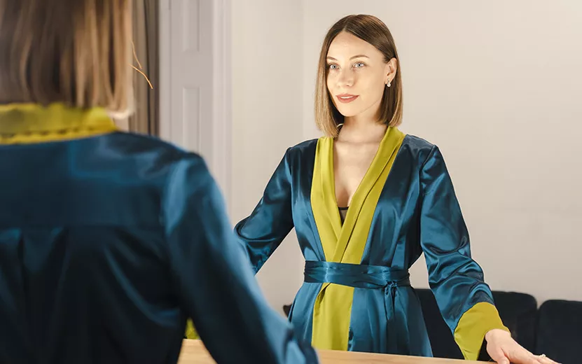 woman-looking-to-her-reflection-into-the-mirror-2022-11-15-09-04-47-utc.jpg