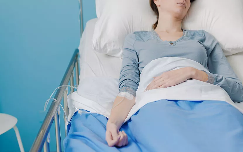 patient-in-a-hospital-bed-with-iv-drip-2022-02-02-04-51-34-uччtc.jpg